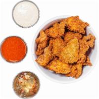 Cajun Chicken Nuggets · All White Meat Chicken Nuggets Tossed In House Cajun Seasoning