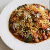 Aloo Tikki with Pindi Channa · Potatoes patties served with chick peas, yogurt coriander and tamaring chutney.