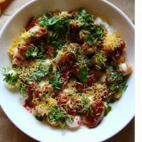 Aloo Papdi Chaat · Flour crisp savory served with chickpea, potato, sweet yogurt, topped with tamarind and mint...