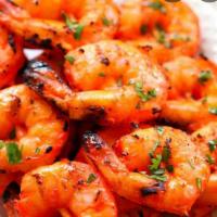 Tandoori Shrimp · Jumbo shrimp marinated in yogurt and spices broiled in tandoor.
