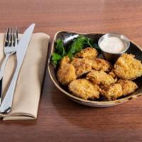 Chicken Fried Pickles · Served with blackened ranch. Vegetarian