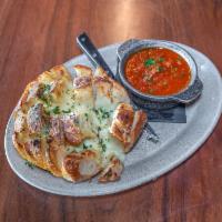 Giant Cheesy Garlic Pull-Apart Bread · Mozzarella, garlic butter, san marzano marinara sauce. Vegetarian