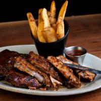 Baby Back Ribs-full rack · Spice rubbed, slow cooked ＆ char grilled, basted with old no. 7 bbq sauce, served with skin-...