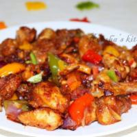 T6. Roast Chilli · Sauteed with bell pepper, white onion and mushroom, carrot and broccoli with a sweet and spi...