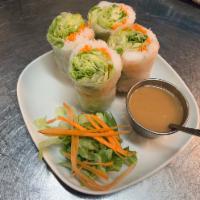 2. Salad Roll with Shrimp · 2 pieces. 
lettuce, mint , carrots and rice noodle wrapped in fresh rice paper served with T...