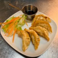 4. Crispy Potsticker · 7 pieces. Fried pork and veggies dumpling served sesame ginger soy dipping sauce.