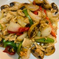 63. Pad Khing · Sauteed ginger with onion, bell peppers and mushroom in a special sauce.