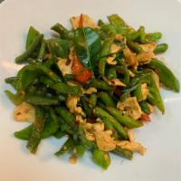 64. Pad Prik Khing · Green bean, bell peppers, kaffir leaves and stir-fried in house spicy chili sauce.