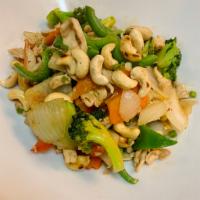 66. The Cashew Nut · Stir-fried with broccoli, onion, carrot, bell peppers and cashew nut in lightly sweet brown ...