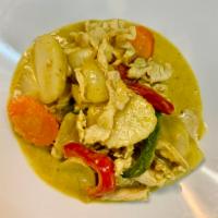 70. Yellow Curry · Thai yellow curry with coconut milk, onion, potato, carrot, bell peppers and sprinkle with s...