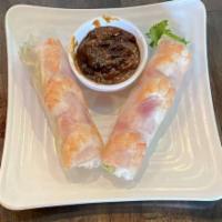 Spring Roll  · 2 pieces. Shrimp and honey baked ham.