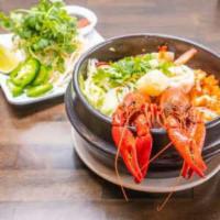 Pho Crawfish · Crawfish, shrimp, scallops, lobster ball, calamari, vermicelli. Spicy. 