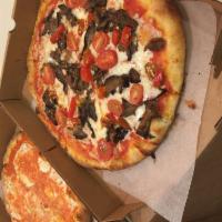 Pizza Randazzo · Roasted eggplant, roasted cherry tomatoes, hot calabrese peppers and fresh basil, extra virg...