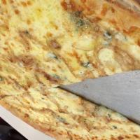 Pizza Bianca (White Pie) · Mozzarella,  Gorgonzola, Caramelized Onions, and  EVO