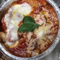 Chicken Parm · Breaded Chicken Cutlets Topped with Mozzarella and Sauce then baked, comes with choice of Pa...