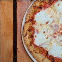 Formaggio Pizza · Red sauce base topped with a delicious blend of shredded mozzarella, parmesan, hand-stretche...