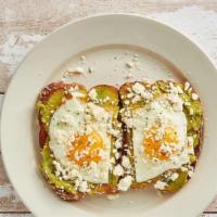 Avocado Toast Special · 2 eggs any style served on 2 slices of whole-wheat toast covered in avocado spread, topped w...
