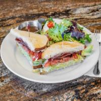 BLT Sandwich · 4 slices of bacon, shredded lettuce, sliced juicy tomatoes, and mayonnaise served on toasted...