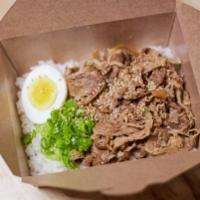 Beef Rice Box  · Thinly sliced beef and onions sauté in sweet soy sauce. garnish with eggs and green onions w...