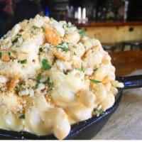 MAC AND CHEESE  · HARLEM CHEESE BLEND, CRUSHED RITZ CRACKER TOPPING