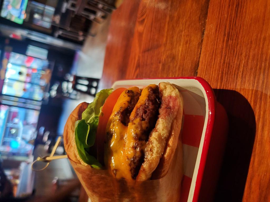 JASPERS SIGNATURE BURGER · double brandt beef patties, american cheese, sliced pickle,boston lettuce on a potato roll and a choice of side