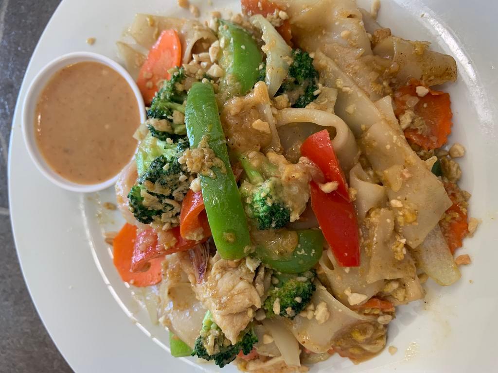 Mali Satay Noodles · Stir fry with broccoli, red and green bell peppers, carrots, onion, cabbage with house special peanut sauce
