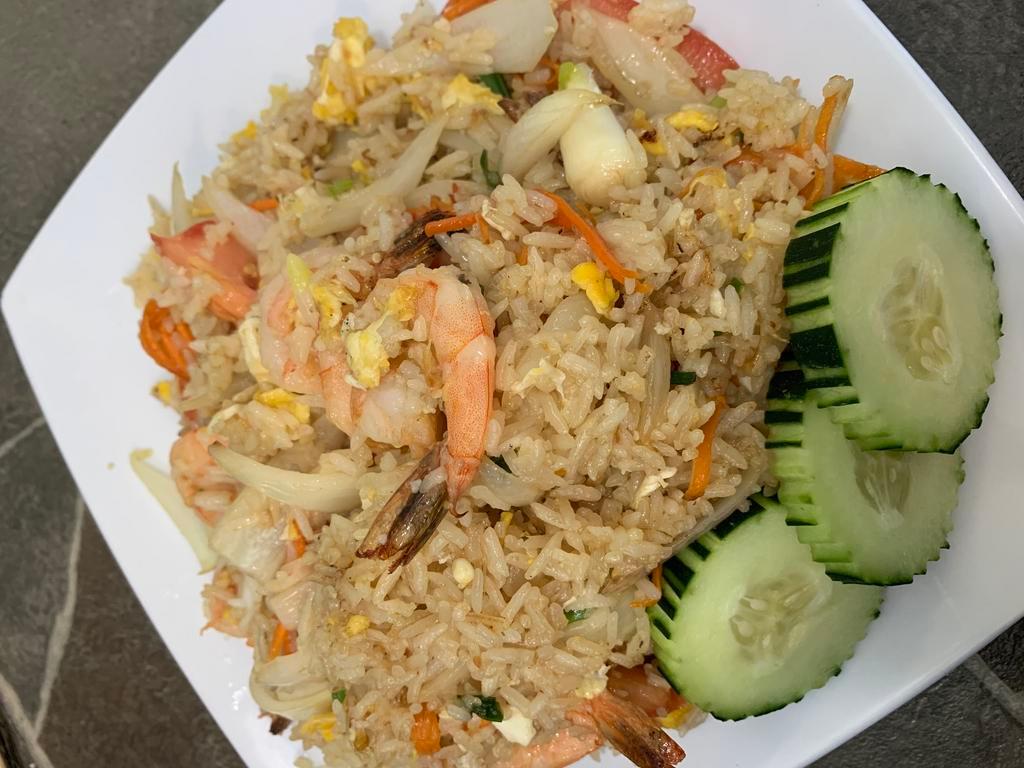 Thai Fried Rice · Stir-fried Jasmine rice with egg, onion, carrot, and tomato