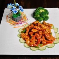 General Tso's Plate · Sauteed with broccoli and bell pepper in a spicy brown sauce. Served with salad and white ri...