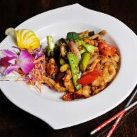 Thai Basil Plate · Basil, bell pepper, onion, snow pea, mushroom, broccoli, and asparagus. Served with salad an...