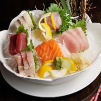 Sashimi Dinner · Chef' choice of 18 pieces sashimi and sushi rice.