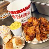 Family Special · 10 pieces of chicken, 2 pint sides and 4 rolls with honey.