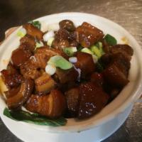 75. Braised Pork with Chestnuts · Served with rice. Mild spicy.