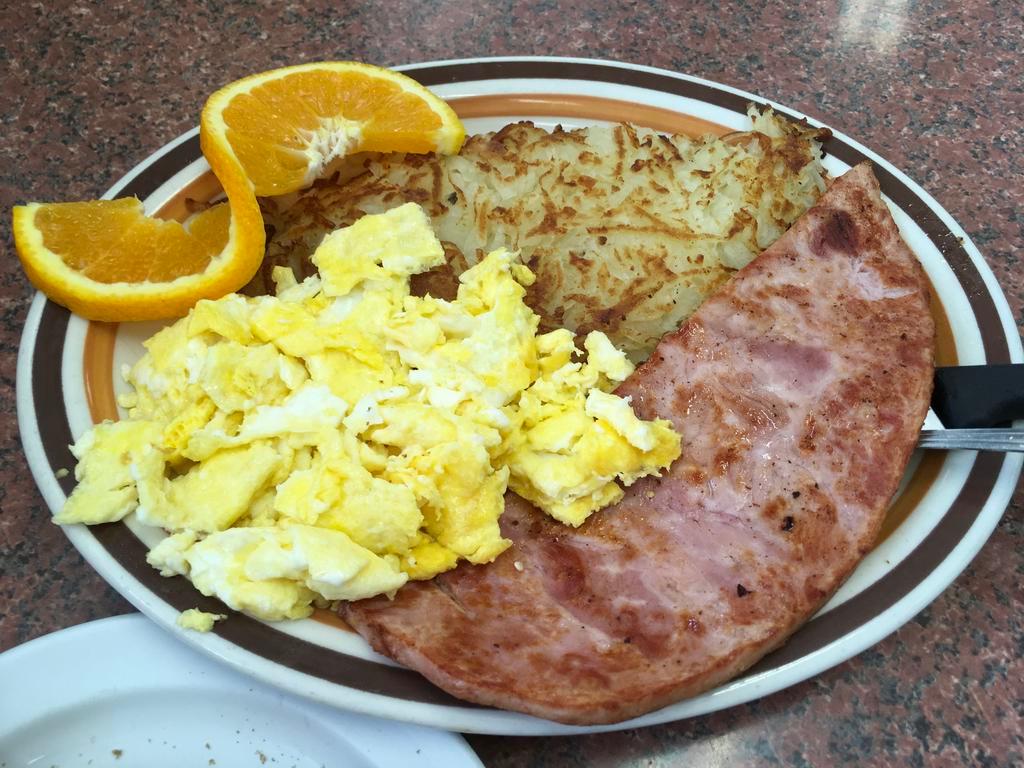 Ham and Eggs · Served with 3 eggs, hashbrowns, toast and jelly.