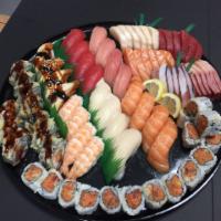 Sushi & Sashimi Tray (70 Pcs) · 4 Of Nigiri: Salmon, Tuna, White Tuna, Yellowtail, Eel, Shrimp. 
2 Order of Sashimi: Salmon,...