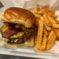 *Texmex Burger · Topped with your choice of BBQ sauce, cheddar jack cheese, bacon and fried onions served on ...