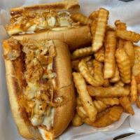 *Buffalo Chicken Cheesesteak · Chopped seasoned steak topped with buffalo sauce, blue cheese, and american cheese. Served o...