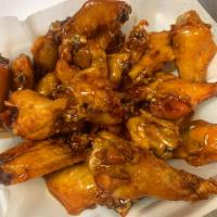 *50 Wings · 50 fried party chicken wings served or coated with your choice of sauce or rub.