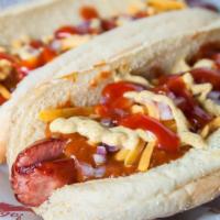 Woody Dog · 1 all-beef black Angus dogs topped with chili, cheese, onions