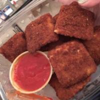 Fried Cheese Ravioli · 8 pieces of cheese ravioli.  Battered and then fried to perfection