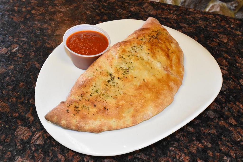 Cheese Calzone · Blend of mozzarella and ricotta cheeses. Served with sauce.
