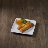 Crispy Spring Rolls · Shredded vegetables wrapped in a delicate pancake then fried. Served w/ sweet & sour sauce. ...