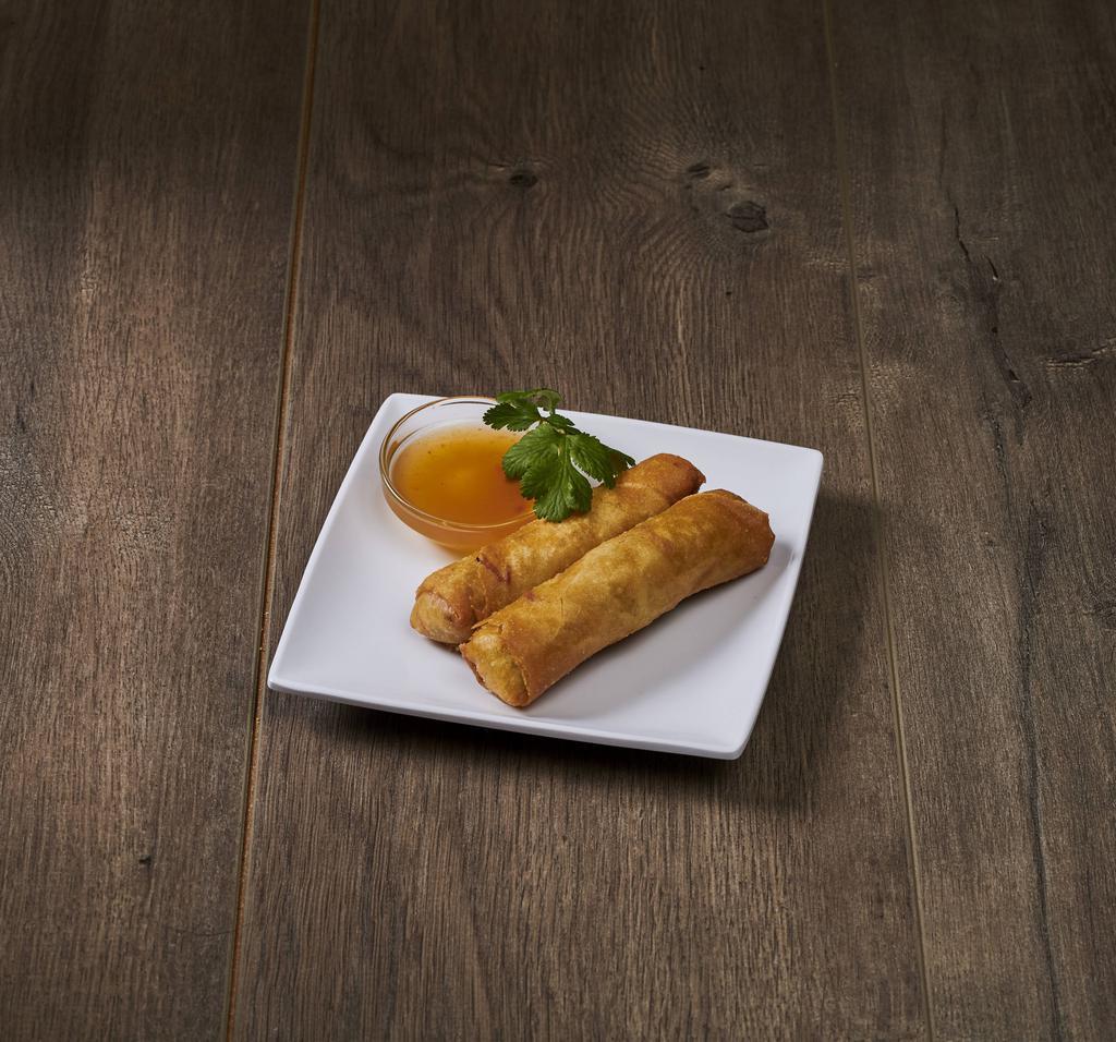 Crispy Spring Rolls · Shredded vegetables wrapped in a delicate pancake then fried. Served w/ sweet & sour sauce. Two pieces per order.