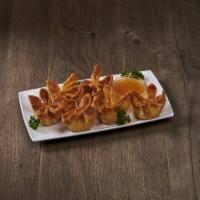 Crab Rangoon · Crab and cream cheese filled wontons fried till golden brown. Six pieces per order.