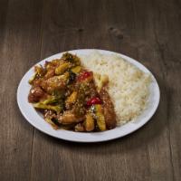 Dinner Sesame Chicken · Deep-fried chicken and vegetables in sweet, tangy sauce. Served with side of rice.