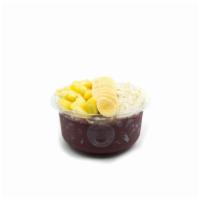 Tropical · Acai blend topped with granola, banana, pineapple, coconut flakes, and honey.