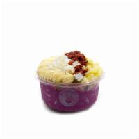 Goji Bowl · Pitaya blend topped with banana, pineapple, goji berries, granola, coconut shavings, and hon...