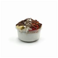 Nutelloco · Coconut blend topped with granola, banana, strawberry, coconut flakes, raw cocoa, and nutell...