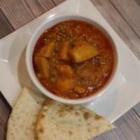 Green Pea, Potato Curry · Mouth-watering potato curry, made with special spices and served with homemade sauce.