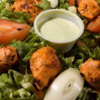 Chicken Salad · Antibiotic-free and marinated boneless chunks of chicken cooked on open flame grill, served ...