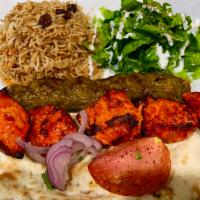 Kofta and Chicken Combo · combination of ground beef kofta and chicken kabob served with bread, rice, salad and cilant...